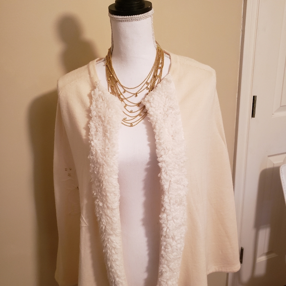 off white cape/ puncho.